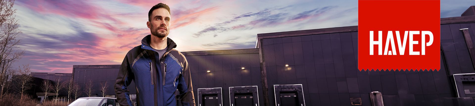 Bild Mann in blau-schwarzem Arbeitsoverall von Havep