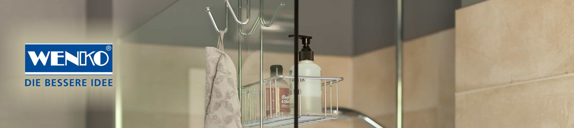 Bild Wenko Metall-Duschkorb an einer Duschwand aus Glas hängend