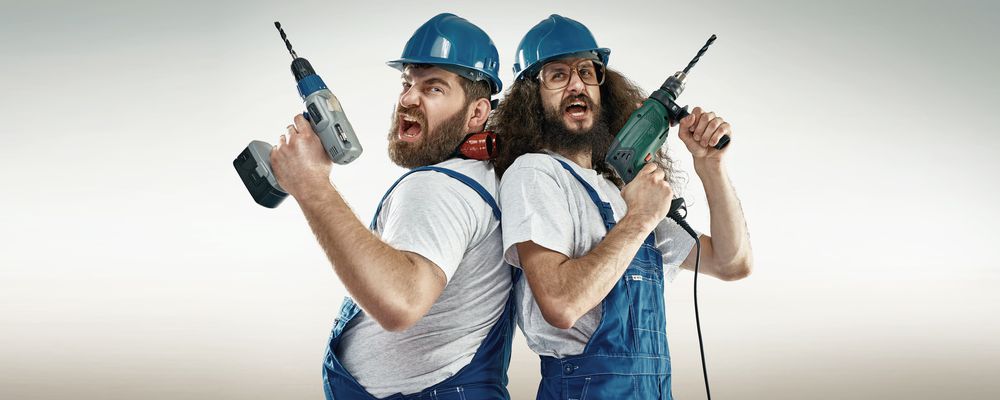 Produktbild Zwei Handwerker mit Bohrmaschinen