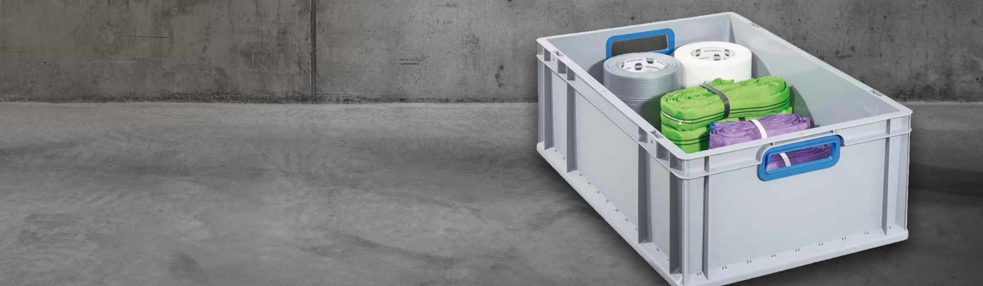 Graue Eurobox von Allit bestückt mit Klebebandrollen und Packgurten bild