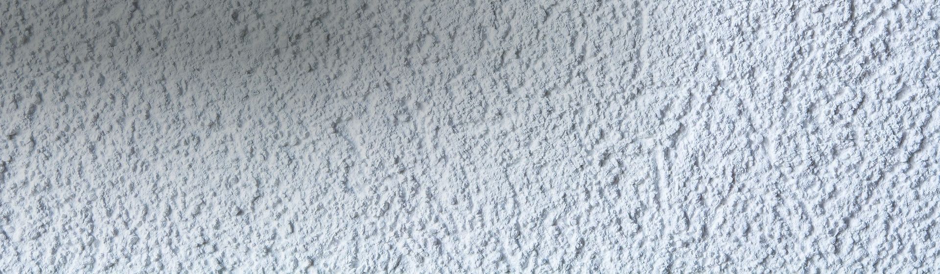 Verputzte Wand in Weiß bild